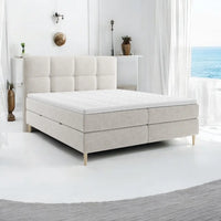 Lit BOXSPRING LEO - Avec tête de lit, coffre intégré, matelas ressorts ensachés et surmatelas inclus