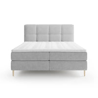 Lit BOXSPRING LEO - Avec tête de lit, coffre intégré, matelas ressorts ensachés et surmatelas inclus