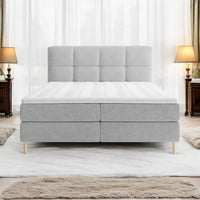 Lit BOXSPRING LEO - Avec tête de lit, coffre intégré, matelas ressorts ensachés et surmatelas inclus